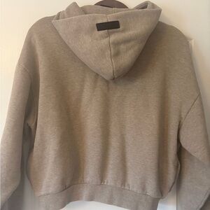 Boys Fear of God Essentials Brown Hoodie with side pockets size 12. $40